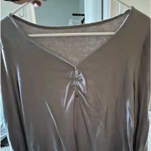 Gray long sleeve blouse.